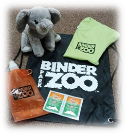 Stuffed elephant, t-shirt, water pouch, bug wipes, and drawstring bag